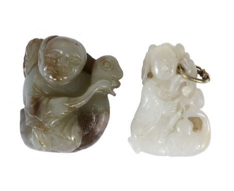  Two jade carvings of a boy and duck group  , the birds holding, respectively, a leafy stem and a sprig of lingzhi fungi in t