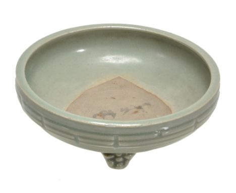  A Longquan celadon tripod censer   raised on three paw supports, the shallow rounded side curve inward to the flat rim carve