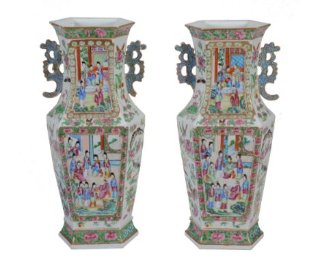  An attractive pair of Cantonese hexagonal famille rose vases, 19th century,   painted with panels of figures on a terrace ag