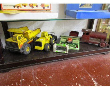 Collection of vintage toys to include tin plate van and Tonka toy diggers (whole shelf)