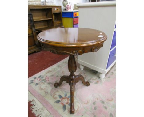 Small mahogany carved tripod table