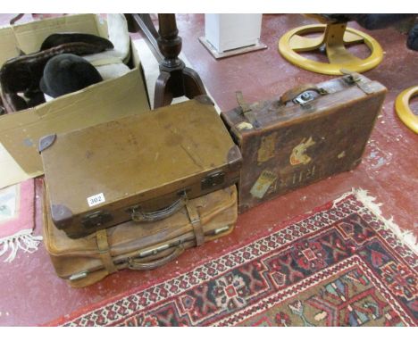 3 vintage leather suitcases
