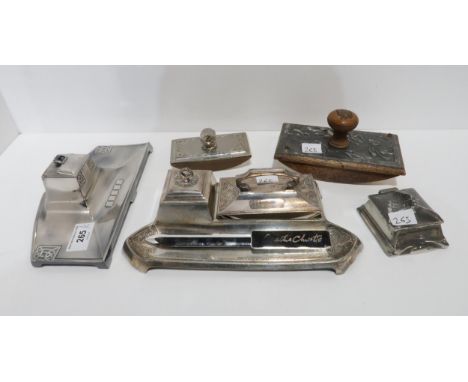 A Kayserzinn stamp box with moth finial, two chromed desk stands, two blotters and a letter knife Condition Report:Available 