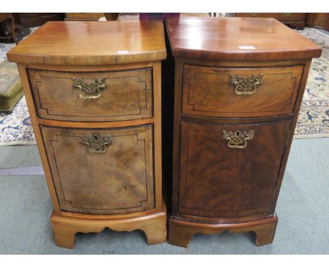 A matched pair of C19th mahogany bedside cabinets on bracket feet, one with a single drawer over cupboard, the other with two