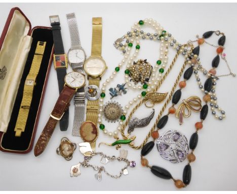 A retro gold plated ladies Tissot watch, further watches, a charm bracelet by Pilgrim and other items Condition Report:Not av