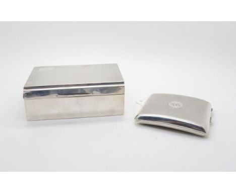 A silver tobacco box with engine turned art deco decoration, by Walker &amp; Hall, Sheffield (date rubbed) c.1930's, and a si