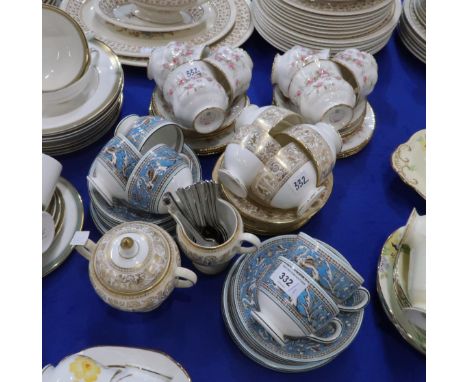 A Wedgwood Gold Florentine tea wares including three saucers, four cups and plates, milk jug, sugar bowl, six turquoise Flore