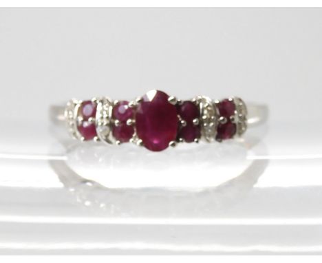 A QVC 9ct white gold ruby and diamond ring, size V1/2, weight 2.7gms Condition Report:Available upon request