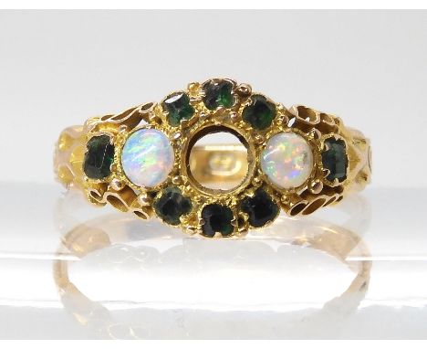 A 15ct gold green gem and opal ring hallmarked Birmingham 1865, size P, (middle gem missing), weight 2.2gms Condition Report: