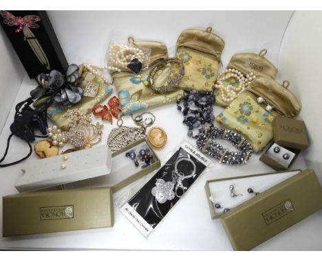 Honora pearl item in original pouches, A Butler &amp; Wilson bow brooch etc Condition Report:Not available for this lot.