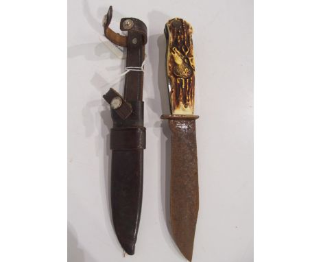 A German hunting knife, blade rusty Condition Report:Available upon request