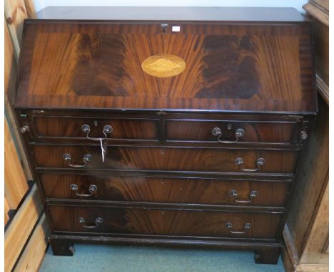 A Victorian mahogany fall front writing bureau with two over three drawers on bracket feet, 97cm high x 100cm wide x 47cm dee