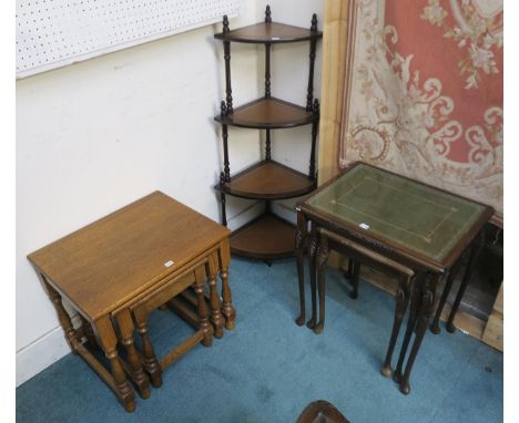 A 20th century oak nest of three tables, mahogany nest of three tables, mahogany four tier corner shelf, mahogany framed wall