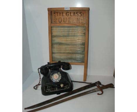 A vintage telephone, bayonet, (rusted and over cleaned) and Glass Queen (3) Condition Report:Available upon request