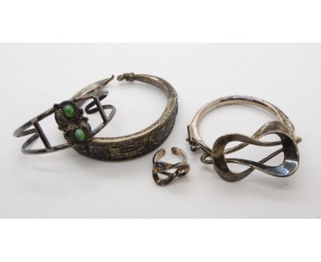 A silver designer Italian lovers knot bangle with matching ring by O.P. Orlandini, a First Nation style turquoise bangle stam