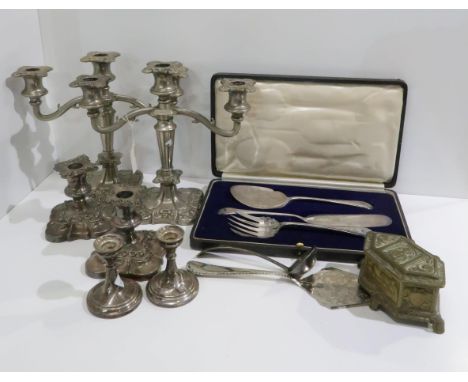 A pair of silver plated three branch candelabra, another smaller EPNS pair, a pair of silver dwarf candlesticks (weighted) by