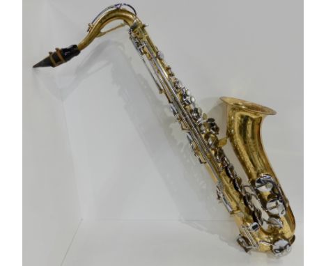 A Melody Maker tenor saxophone bearing the Selmer S harp logo serial number 65505 with case Condition Report:Available upon r