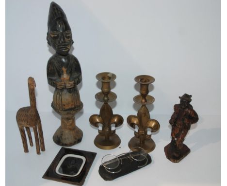 A carved African figure, pair of brass candlesticks, vintage spectacles etc&nbsp; Condition Report:Available upon request