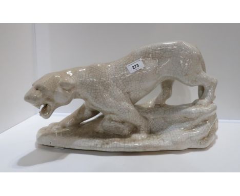 A large crackle glaze model of a lion Condition Report:Available upon request