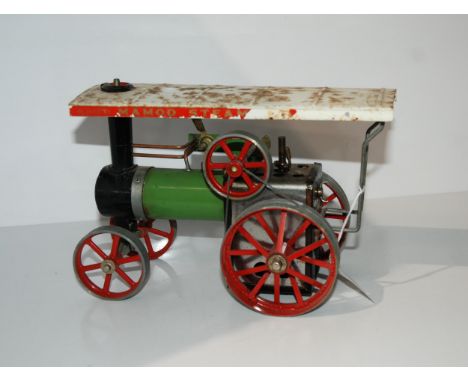 A Mamod steam tractor engine, 25cm wide Condition Report:Available upon request