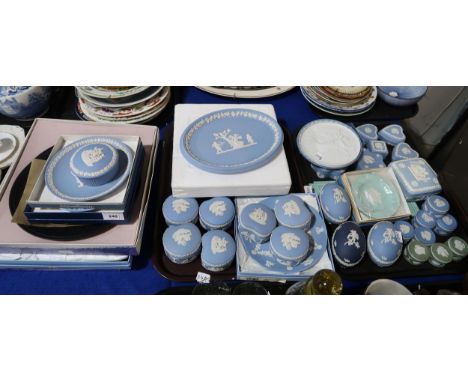 A collection of Wedgwood jasperware including trinket boxes, patch boxes, plates in various colours and other items Condition