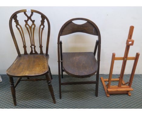 A Victorian elm dining chair, folding chair and a pine folding countertop easel (3) Condition Report:Available upon request