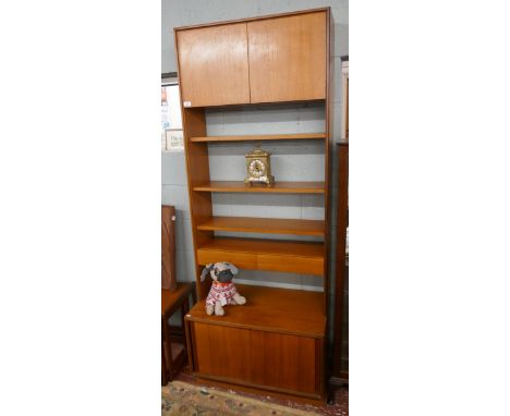 Mid-century G-Plan shelf unit. The dimensions are approximately:Width: 76.5cmHeight: 198.7cmDepth: 46cm