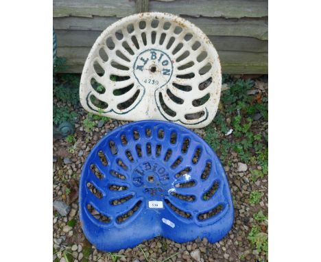 2 cast iron tractor seats 