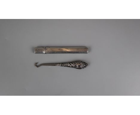 Silver fruit knife together with a silver handled button hook 