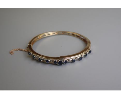 Fine gold sapphire &amp; diamond bangle (total weight approx 15g)