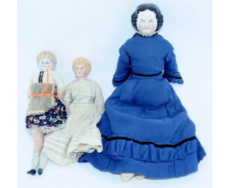 German china head and parian bisque antique dolls x three: (1) black moulded hair, painted features, cloth body, 16"/41cm; (2