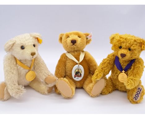 Steiff trio of bears: (1) The Millennium Bear, yellow tag 645701, limited edition, white mohair, swing label (detached), no c