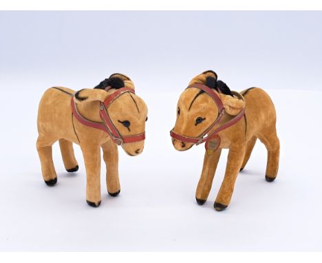 Steiff pair of velveteen donkeys, 1960s, EAN 141200, beige velveteen (one more faded than the other), one with cloth tag and 
