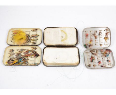 Three vintage fishing fly tins containing early flies, including one black lacquered tin by Mullocks, the largest flies 3 inc