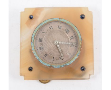 A good quality French desk clock, 1920s, the circular white metal dial engine turned and with enamelled Roman numerals, enclo