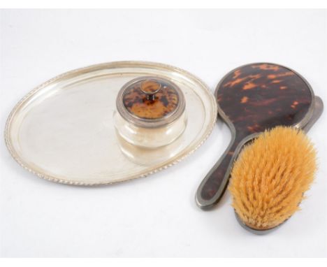 Oval silver engine-turned tray, Adie Brothers Ltd, Birmingham 1928, silver and tortoiseshell brooch and mirror C &amp; A Lond