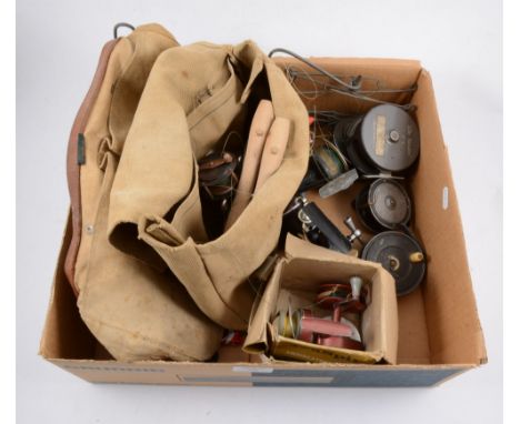 Assorted vintage fishing reels and tackle, including salmon and trout fly reels, spool reels, a line drier and two canvas sho