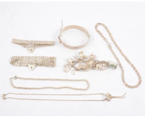 A collection of silver jewellery - an eight bar gate link bracelet with padlock fastener, a 15.5mm wide solid half hinged ban