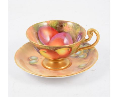 A Royal Worcester cup and saucer, hand painted fruit design signed E Townsend.
