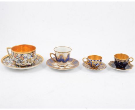 Sixteen assorted 19th Century cups and saucers, English and Continental, including two Coalport cabinet coffee cans (32)