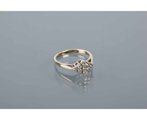 DIAMOND CLUSTER RING
with a boat shaped cluster of brilliant cut diamonds totalling approximately 0.45 carats, hallmarked eig