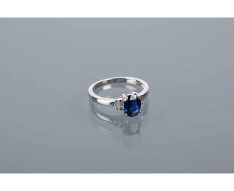 ART DECO STYLE SAPPHIRE AND DIAMOND RING
with central oval sapphire of 1.05 carats, flanked by four baguette cut diamonds, ha