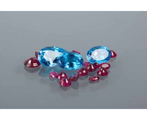 COLLECTION OF UNMOUNTED RUBY AND TOPAZ STONES