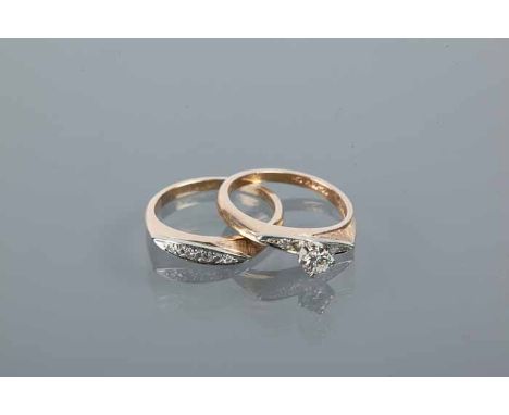 DIAMOND SOLITAIRE RING
the brilliant cut diamond approximately 0.26 carats, marked "14K 18K" for fourteen and eighteen carat 