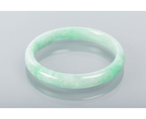 JADEITE BANGLE
the jadeite in green tones, 60mm diameter to the inner edges