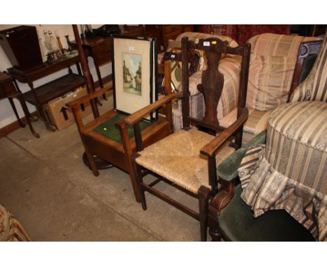 An oak and rush seated carver; together with a commode chair; and a mahogany standard lamp