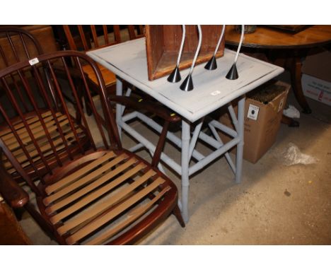 A stripped pine hanging corner wall shelf; together with a painted bamboo two tier table 