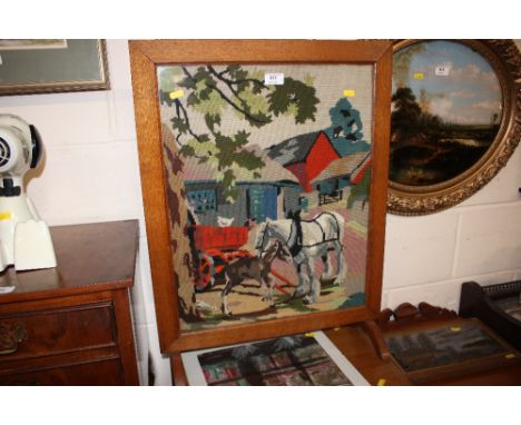 An oak and wool work firescreen 