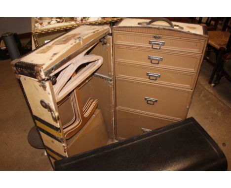 A 1920's / 30's steamer trunk with various labels 