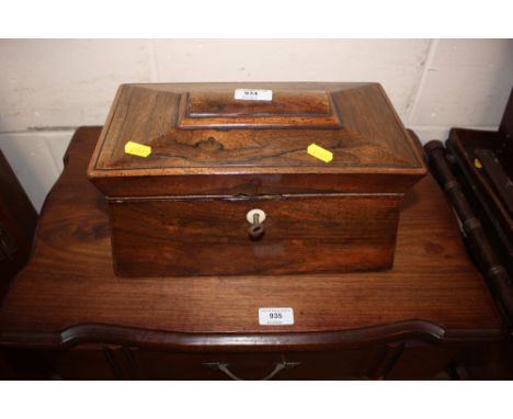 A 19th Century rosewood tea caddy with brass handles 